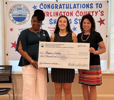 BCRCC Board Member Bridget Wiese presents our scholarship.